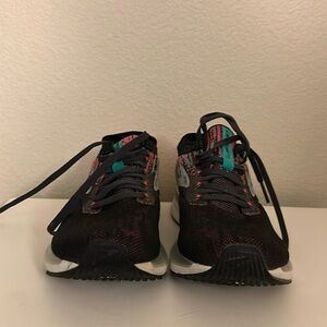 Black and Hot Pink Brooks Ricochet Running Shoe.